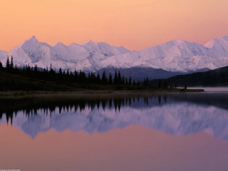 Mountain range reflection sunset pink 5 - a pink sky in the background free wallpaper