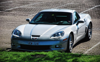 Silver sports car parking lot 18 - a silver sports car free wallpaper