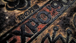 Rusted metal sign constantine andreou - a mosaic free wallpaper