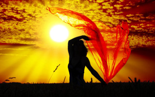 Woman sunset red scarf backlighting - a sunset free wallpaper for desktop