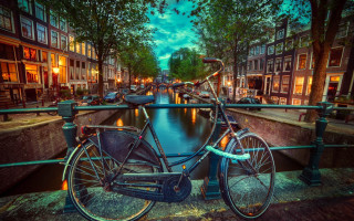 Bicycle bridge canal night cityscape - a bicycle free wallpaper