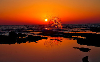 Sunset wave shore reflection ocean - the water and a person free wallpaper