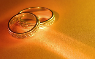 Wedding rings yellow surface shadow - a yellow surface free wallpaper