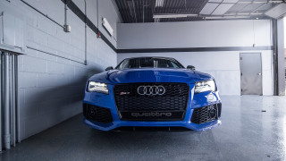 Blue car garage white bricks - a garage next free wallpaper