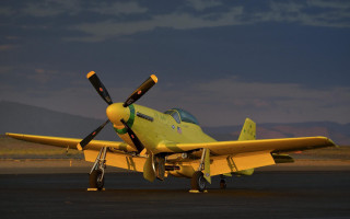 Yellow airplane runway mountains dusk - anson maddock free wallpaper
