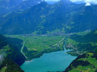 Lake mountains valley town plane - a plane window free wallpaper