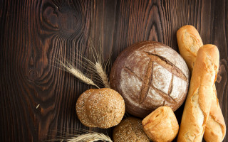 Breads rolls table wooden background 2 - a wooden background free wallpaper