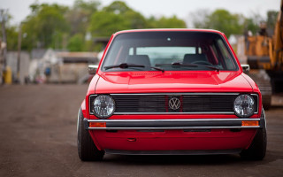 Red car parking lot dump - clean line free wallpaper