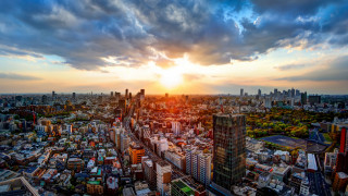 Tokyo sunset cityscape clouds bridge - a city in the foreground free wallpaper