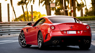 Red sports car palm trees 5 - a parking meter free wallpaper