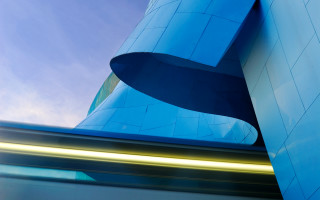 Blue building curved corner abstract - a blue building free wallpaper