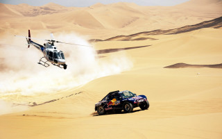 Helicopter over desert car action - free motorcycles wallpaper