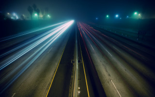 Highway traffic night city lights - traffic free wallpaper