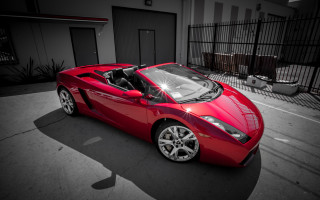 Red sports car parking lot 42 - area free wallpaper