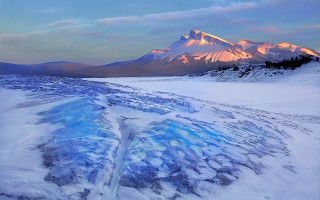 Snow covered mountain stream lake - a few snow covered mountains free wallpaper