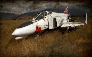 White fighterjet grassfield mountains clouds - a dry grass field next free wallpaper