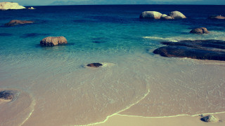 Beach rocks water sky clouds 3 - a few wave free wallpaper