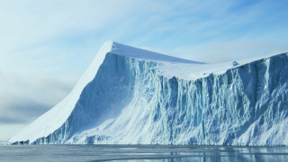 Large iceberg mountain water sky - a large iceberg free wallpaper