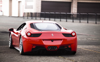 Red sports car parking lot 39 - a garage door open free wallpaper