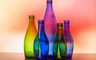 Colorful bottles table gradient background - a table top free wallpaper