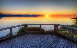 Wooden deck lake sunset mountains - a wooden deck free wallpaper