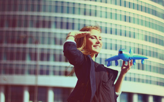 Woman toy airplane glass building - anka zhuravleva free wallpaper