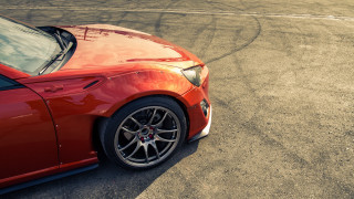 Red sports car track person - insane detail free wallpaper
