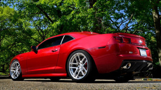 Red sports car parking lot 72 - a parking lot next free wallpaper