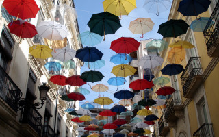 Colorful umbrellas street surrealist neo - a city street free wallpaper
