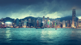 City skyline mountain night water - a large body of water in front free wallpaper