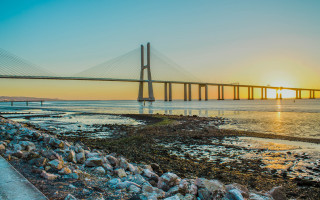 Bridge water sunset clouds land - some water free wallpaper