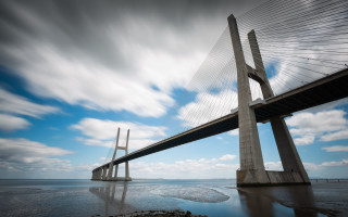 Large bridge over water mountains - a large bridge free wallpaper