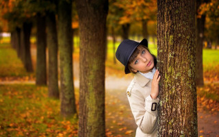Girl leaning against tree autumn - the path free wallpaper