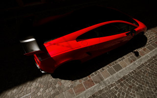 Red sports car brick road 4 - a brick road free wallpaper