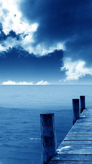 Pier boat cloudy sky ocean - the water under a cloudy sky free wallpaper for mobile