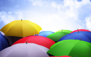 Colorful umbrellas field blue sky - the middle of a field free wallpaper