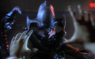 Demonic alien large head hands - front of him free wallpaper