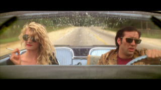 Man woman driving car rain 2 - movie scene free wallpaper