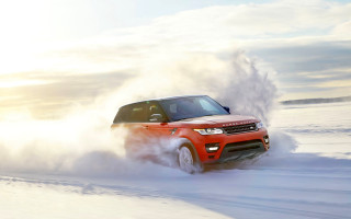 Red land rover snow sunlight - the front free wallpaper