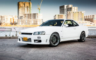 White car city skyline crane - pearlescent free wallpaper