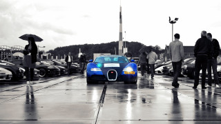 Bugatti parking lot umbrella tiltshift - a bugatti car free wallpaper