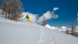 Ski jump snowy hill trees - ski free wallpaper