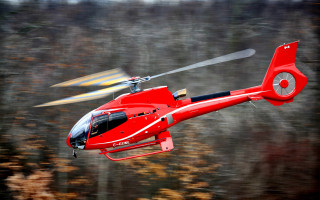 Red helicopter flying over fall - the fall season free wallpaper