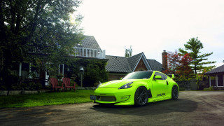 Bright green sports car country - a red chair free wallpaper