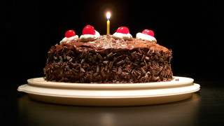 Chocolate cake candle plate food - free holidays wallpaper