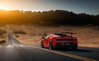 Red sports car sunset road - the road free wallpaper