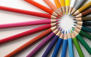 Colored pencils circle crayon art - a white center free wallpaper
