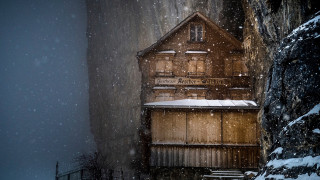 Wooden building snow storm cliff - roof free wallpaper
