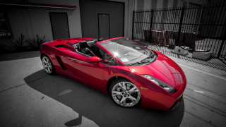 Red sports car parking lot 9 - a parking lot next free wallpaper