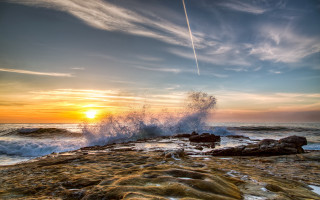 Wave rocky shore sunset ocean - a jet free wallpaper